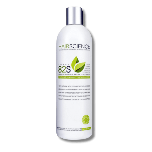 Hair Science Formula 82s shampoo bottle with green leaves on a white background